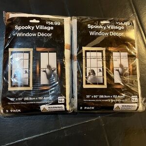 Spooky Village Window Decor 2 Packs of 2 (4Total) Size 35” x 60”. Trapped. NWT.